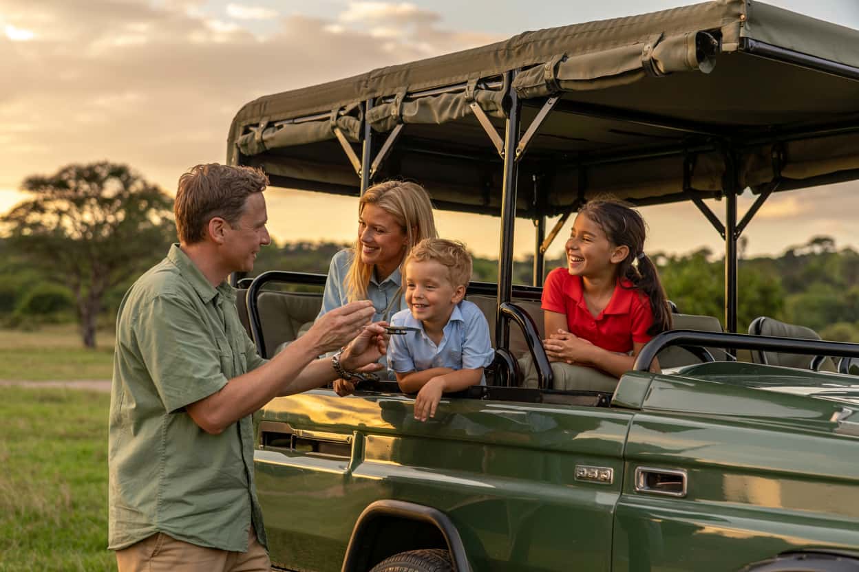 Family enjoying wildlife viewing on safari